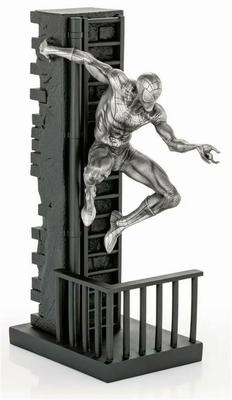 Pewter statue of Spider Man climbing down wall